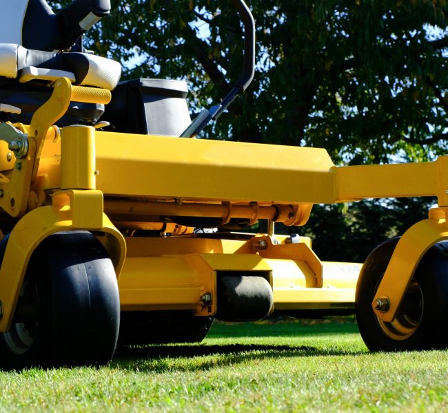 The,Yellow,Zero-turn,Mower,Parked,In,The,Middle,Of,The